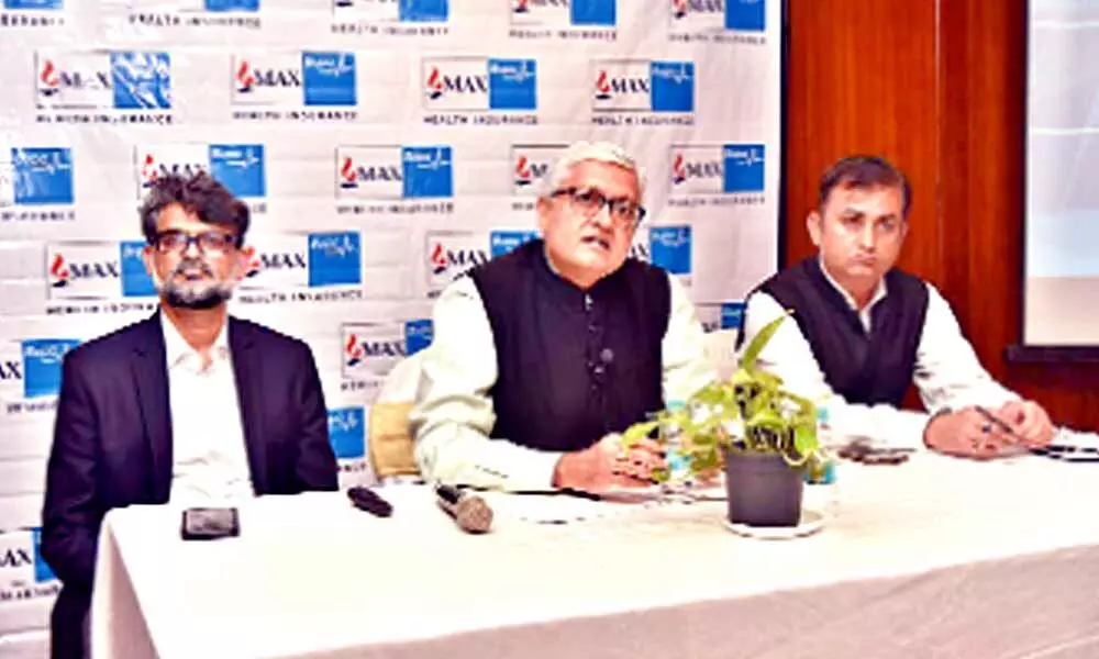 Krishnan Ramachandran, MD & CEO, Max Bupa, addressing mediapersons in Hyderabad on Tuesday. He is flanked by Bhabatosh Mishra and Praveen Pathak