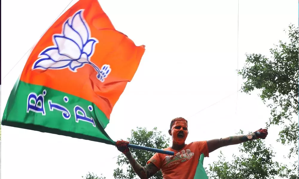 NDA retains Assam with larger BJP share