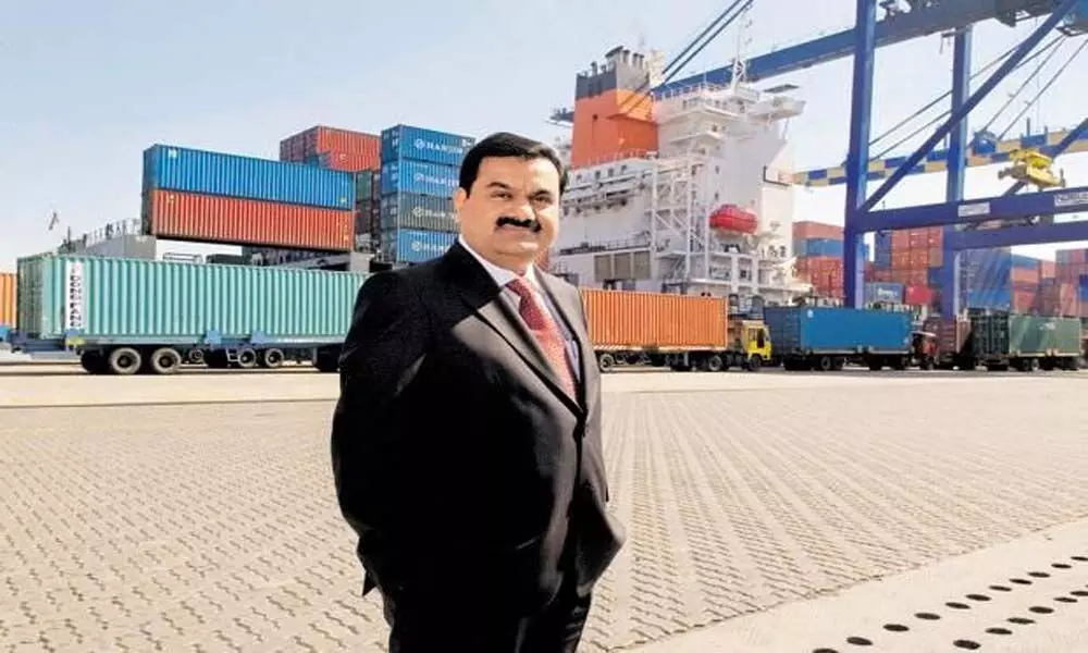 Cong trains guns on Adani group