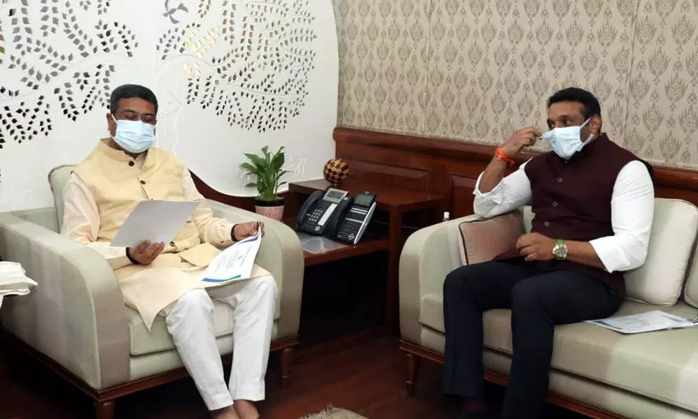 AP Industries Minister Mekapati Goutham Reddy with Union Minister Dharmendra Pradhan in New Delhi