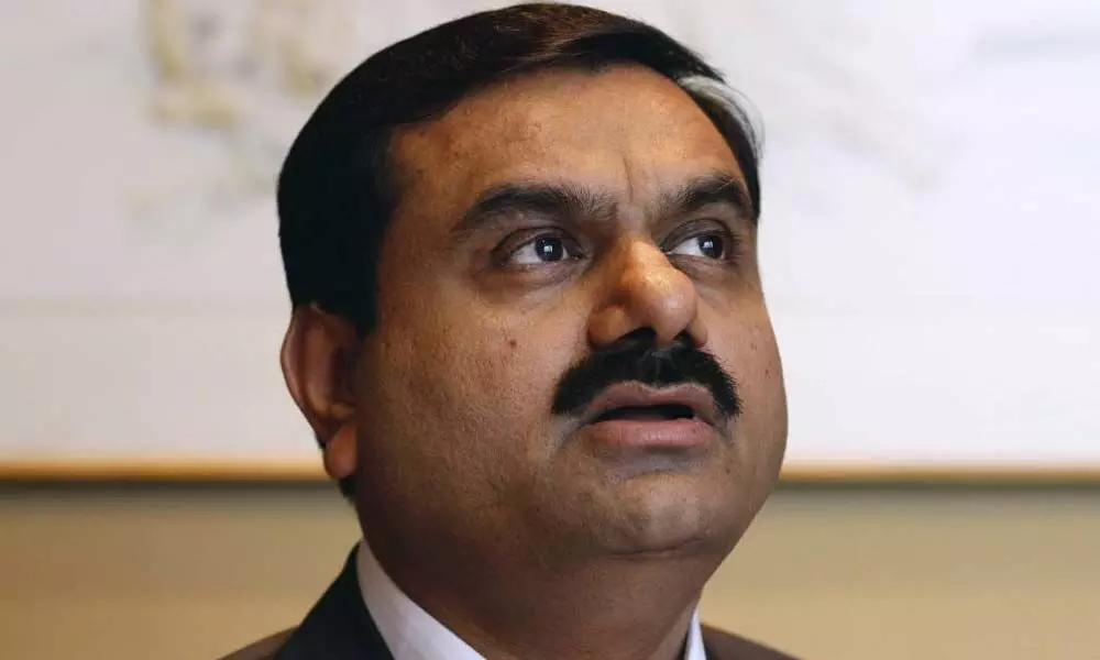 Adani increasing fossil fuel footprint despite pledge to turn carbon neutral