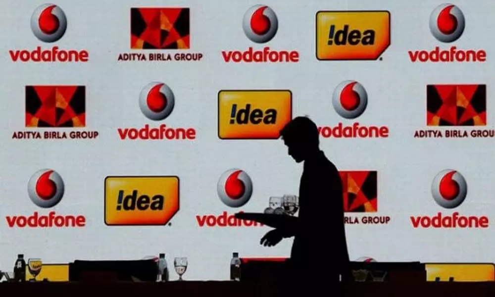 Vodafone Idea shares tumble over 24%, pare loss