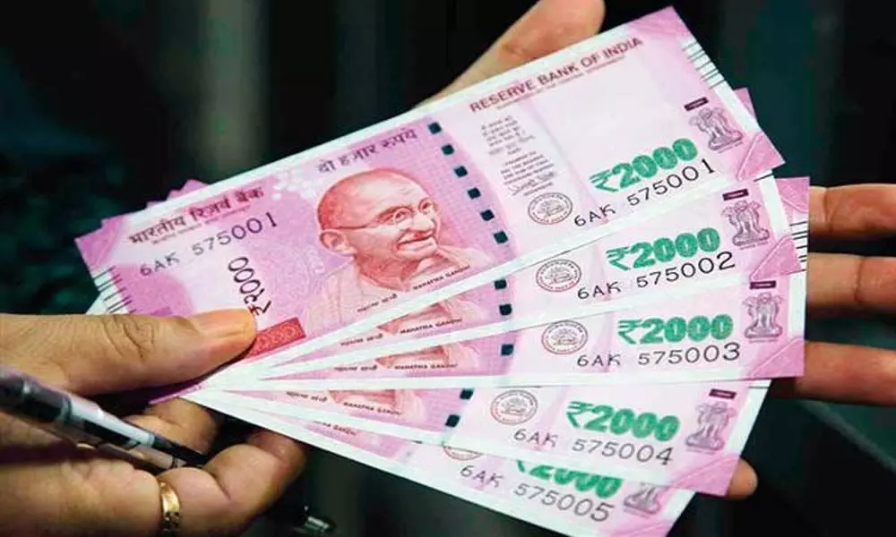 Rupee rises on weaker greenback