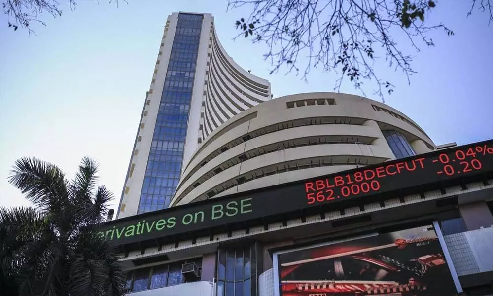 Indices end flat; Nifty closes at record high