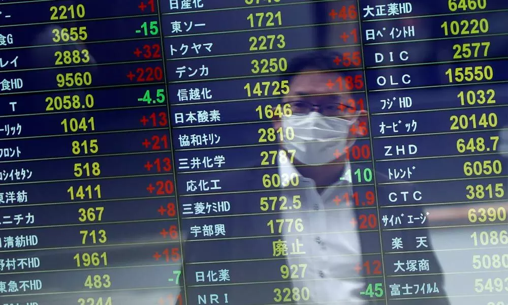 Moderate rise in Asian stocks as Fed frames rate hike timeline