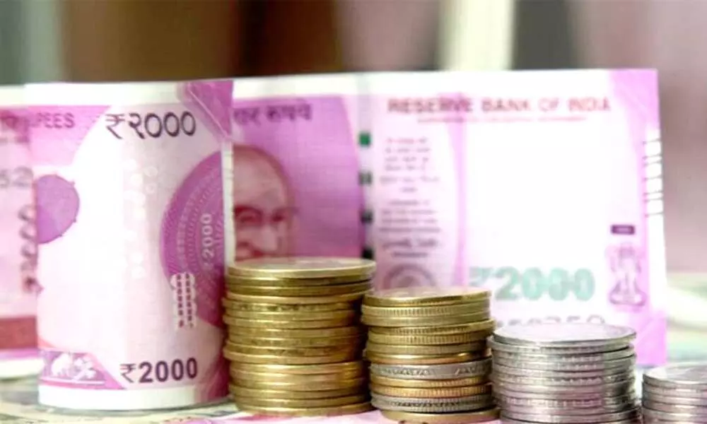 Equities settle low on weak rupee, possible global policy hardening stance