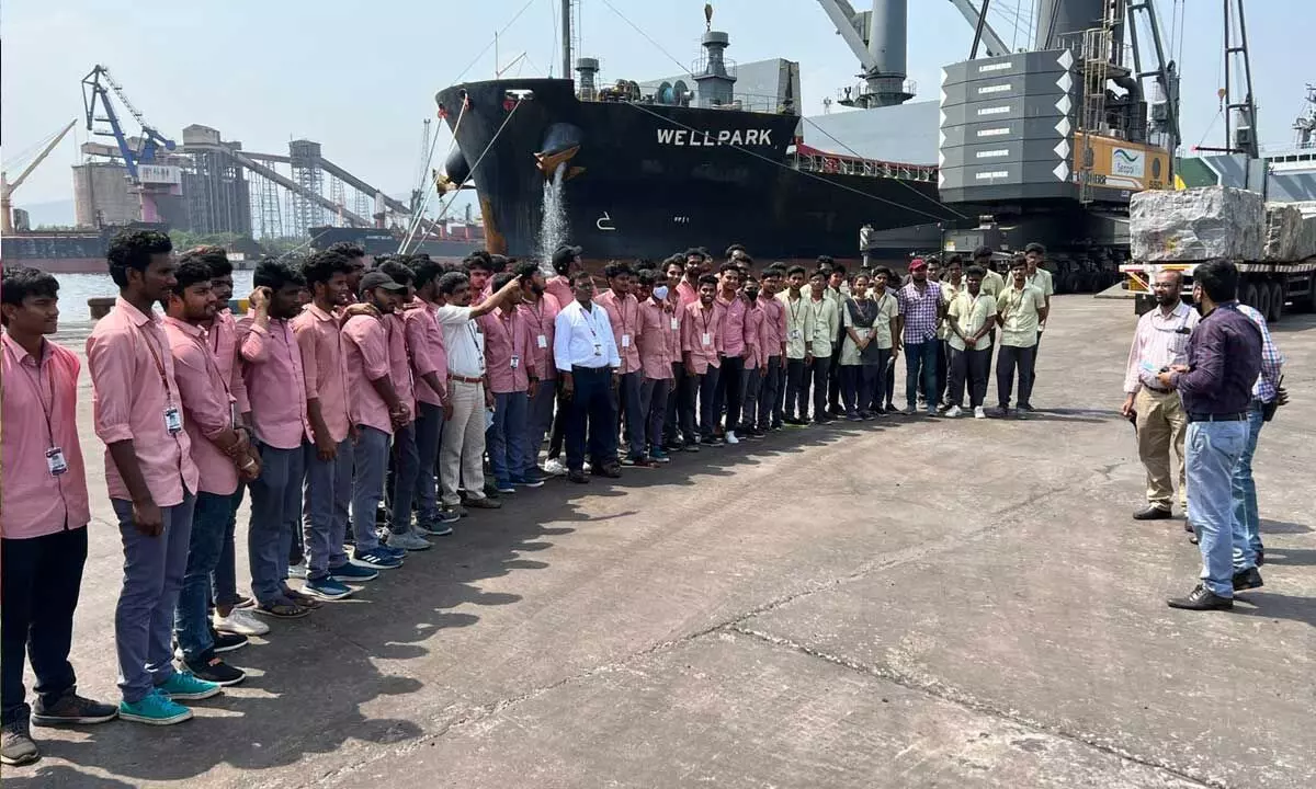 Students being explained about various operations during their visit to Vishakhapatnam Port