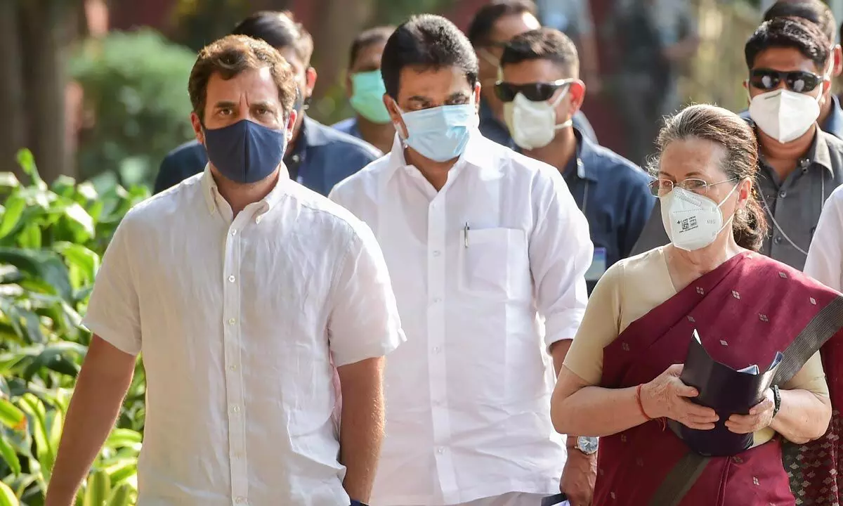 Congress President Sonia Gandhi with party leaders Rahul Gandhi and KC Venugopal arrives for the Congress Working Committee meeting, at the AICC headquarters, in New Delhi, Monday