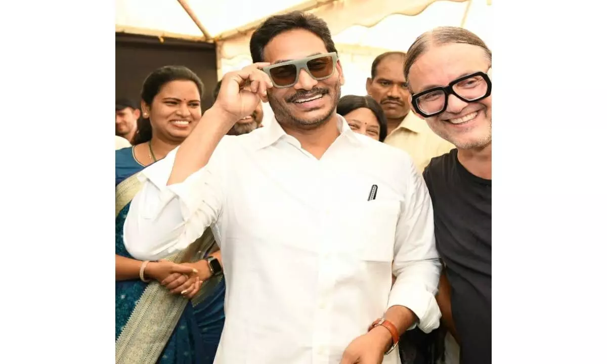 AP Chief Minister Y S. Jagan Mohan Reddy trying goggles made from recycled plastic at a programme in Visakhapatnam on Frida