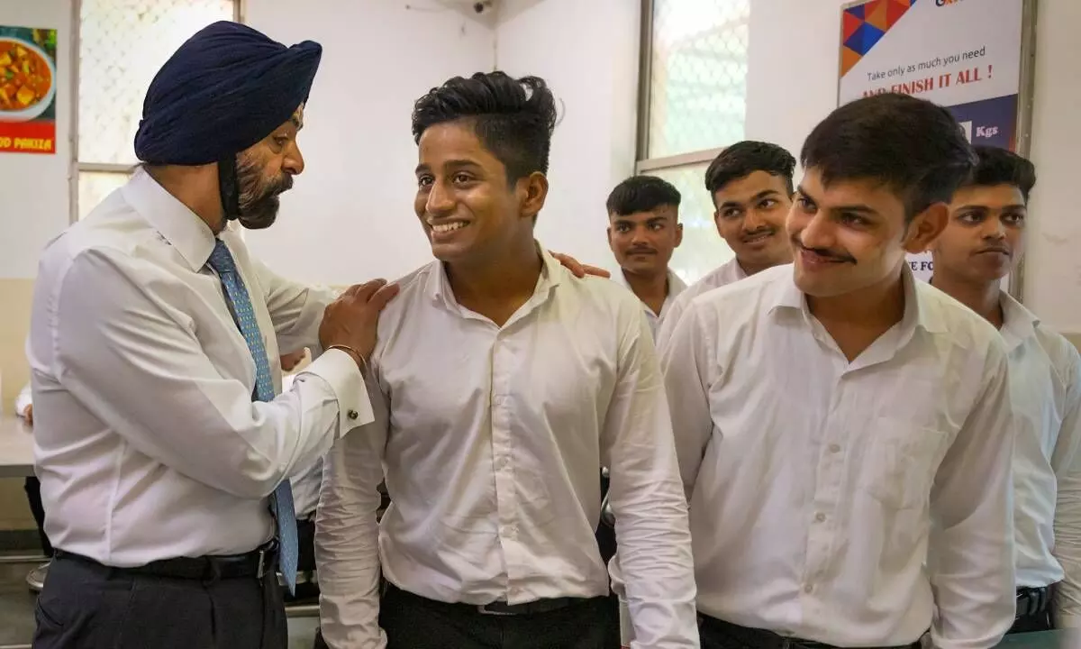 World Bank President Ajay Banga interacts with students at GMR Varalakshmi Centre for Empowerment and Livelihood, in New Delhi on Wednesday