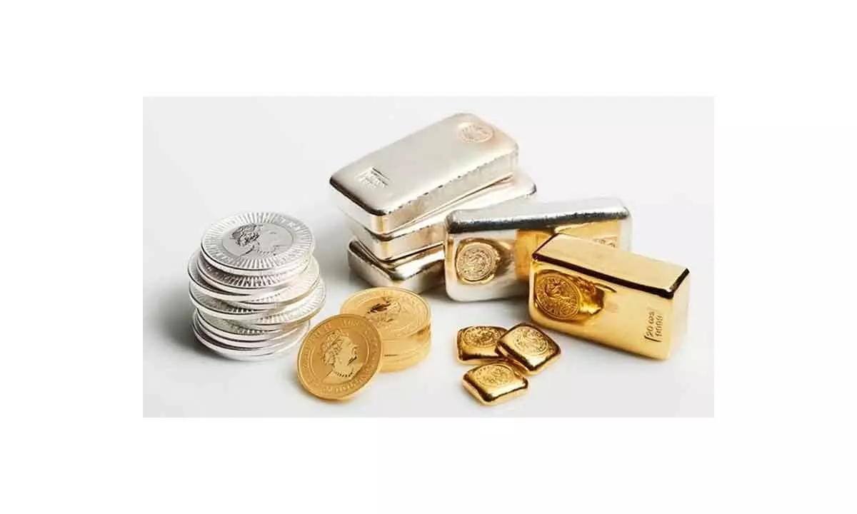 Bullion prices fall on strong US data