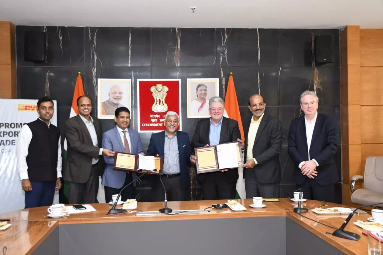 Sunil Barthwal, Commerce Secretary, Santosh Sarangi, DG, DGFT, John Pearson, Global CEO of DHL Express at the signing of the MoU