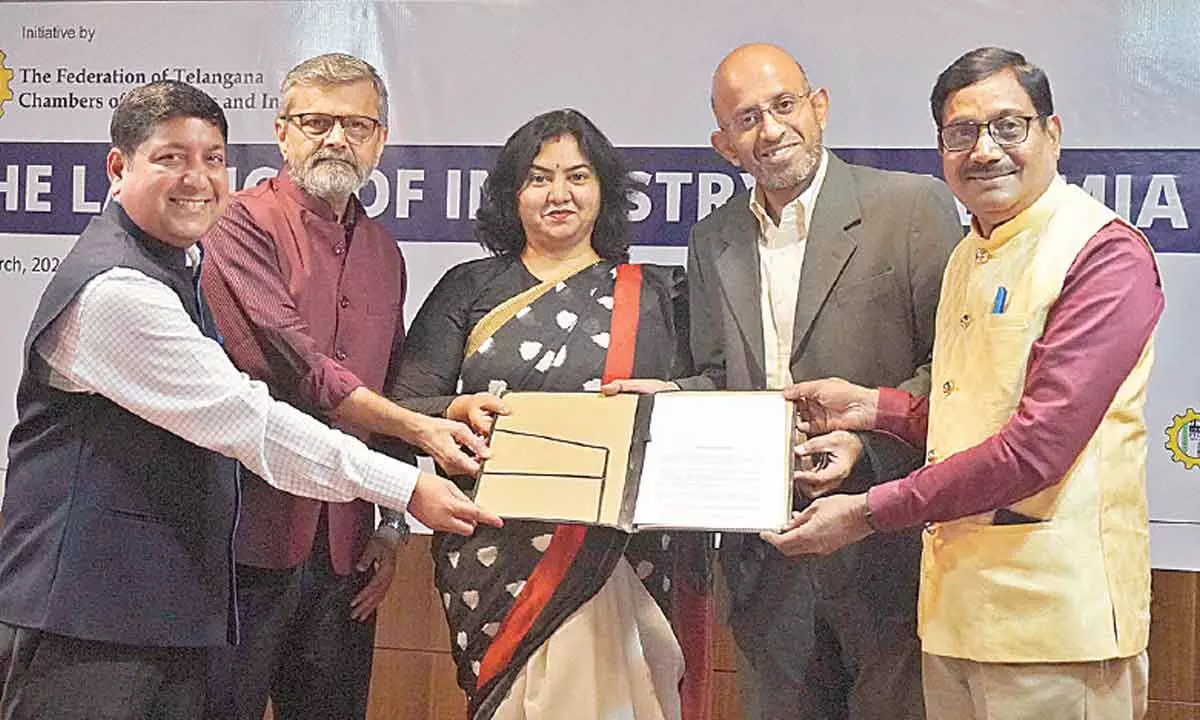 ICT Committee of FTCCI enters MoU with four companies. Seen in the picture is T Sudershan of TalentFarm exchanging MoU with P Sangeetha, Director, FTCCI