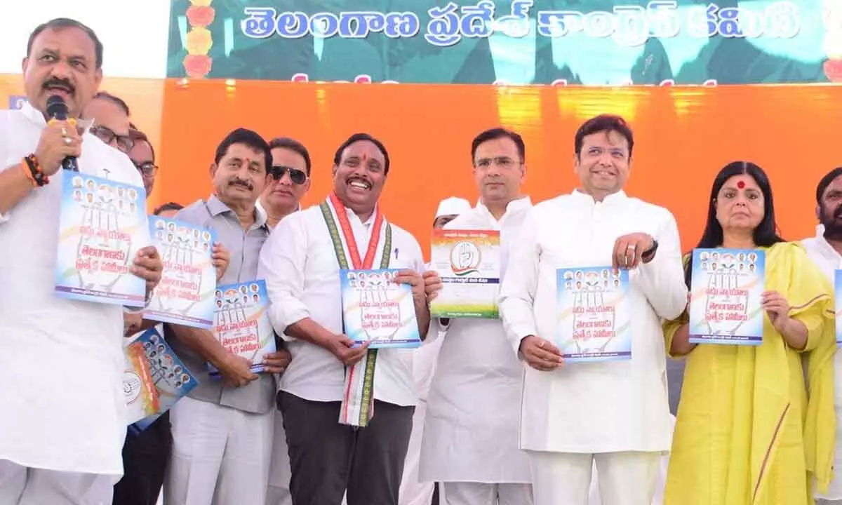 The manifesto being released by AICC in-charge Deepadas Munshi, Manifesto Committee Chairman, Industries Minister Sridhar Babu, Chief Ministers Advisor Vem Narender Reddy, TPCC Working President Mahesh Kumar Goud, Azharuddin, Anjan Kumar Yadav, Chinna Reddy, AICC Secretary in hyderabad on friday