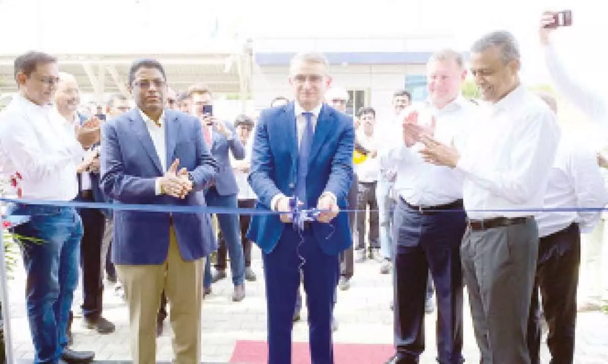 Oleg N Avdeev, the Russian Consul General in Chennai, cutting the ribbon marking the inauguration of the unit. Ravindra  Sannareddy, Aleksandr Gerasimenko and others are seen