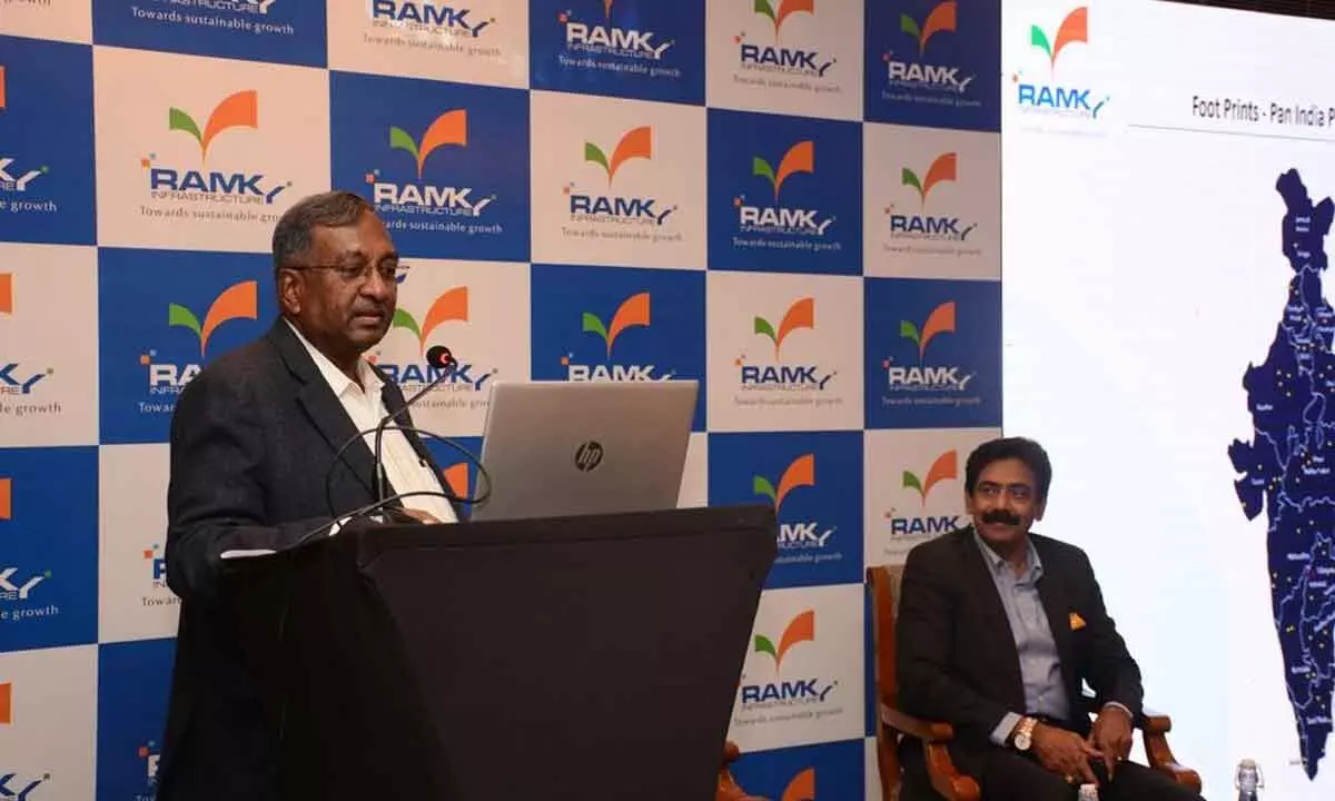 Y R Nagaraja, MD, Ramky Infrastructure Ltd addressing media, while NS Rao, Group Financial Officer, Ramky Group, looks on during announcement of the financial results in Hyderabad on Wednesday