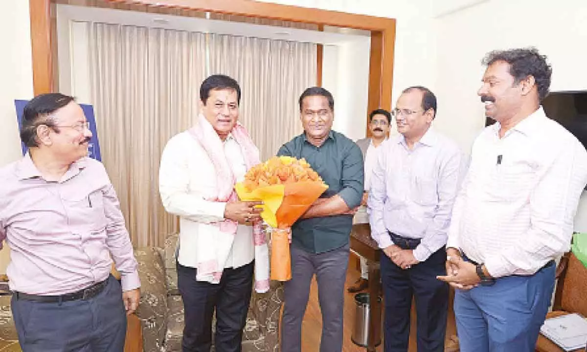 Visakhapatnam Port Authority Chairman M Angamuthu, Deputy Chairman Durgest Dubey and Secretary T Venu Gopal during a courtesy call on Union Minister for Shipping, Ports and Waterways Sarbananda Sonowal in Delhi on Thursday