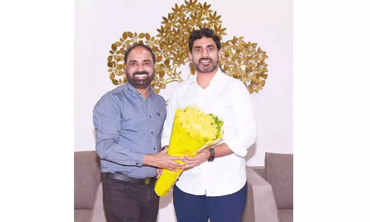 Y Guru, Chairman and Managing Director of Celkon Group, with Nara Lokesh