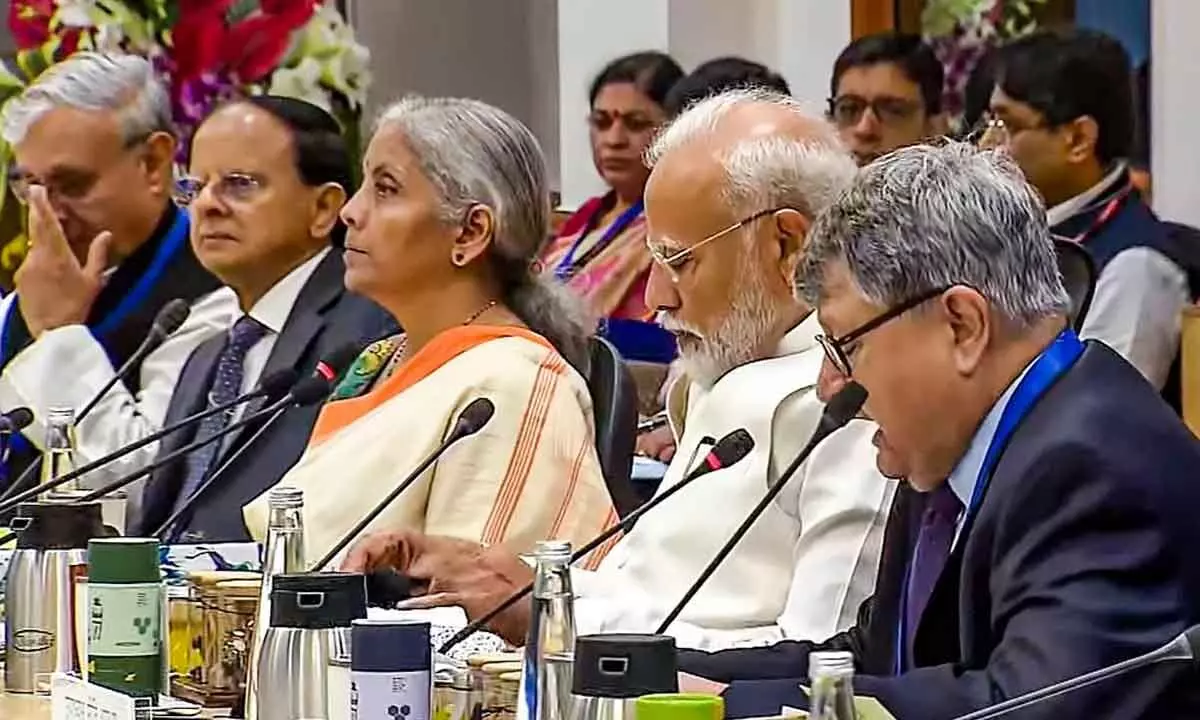 Prime Minister Narendra Modi, Finance Minister Nirmala Sitharaman and others during a meeting with economists at NITI Aayog in New Delhi on Thursday