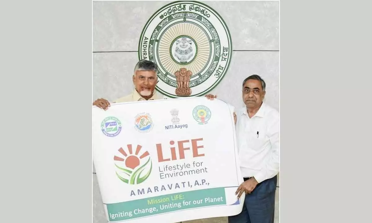 Andhra Pradesh Chief Minister N Chandrababu Naidu unveiling an emblematic poster on Mission LiFE- prepared by A Chandra Sekhara Reddy, Advisor of Bureau of Energy Efficiency (BEE) for the Southern States and UTs- in Amaravati on Sunday