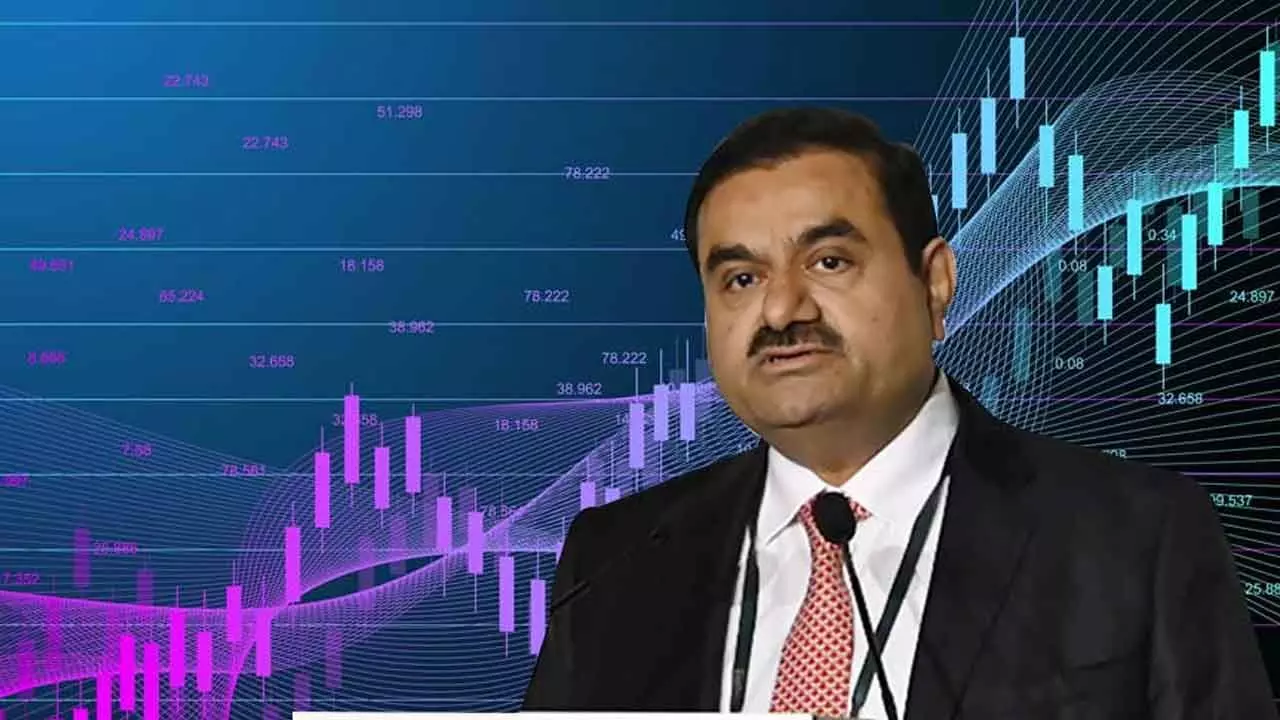 8 Adani group stocks settle lower