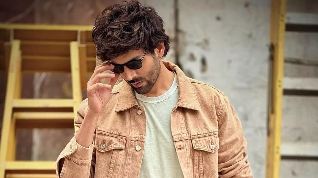 Karan Johar Reconciles with Kartik Aaryan, Announces New Romantic Comedy – Watch the Reveal