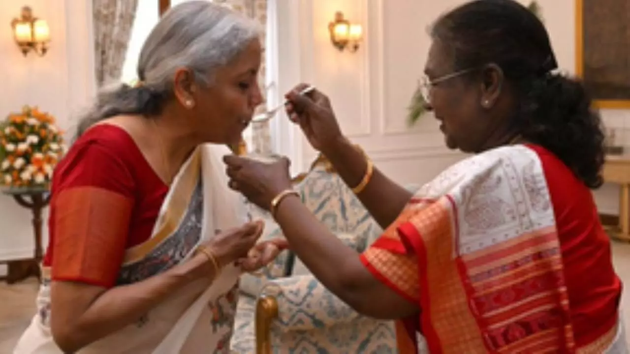 President Murmu feeds customary dahi-cheeni to FM Sitharaman